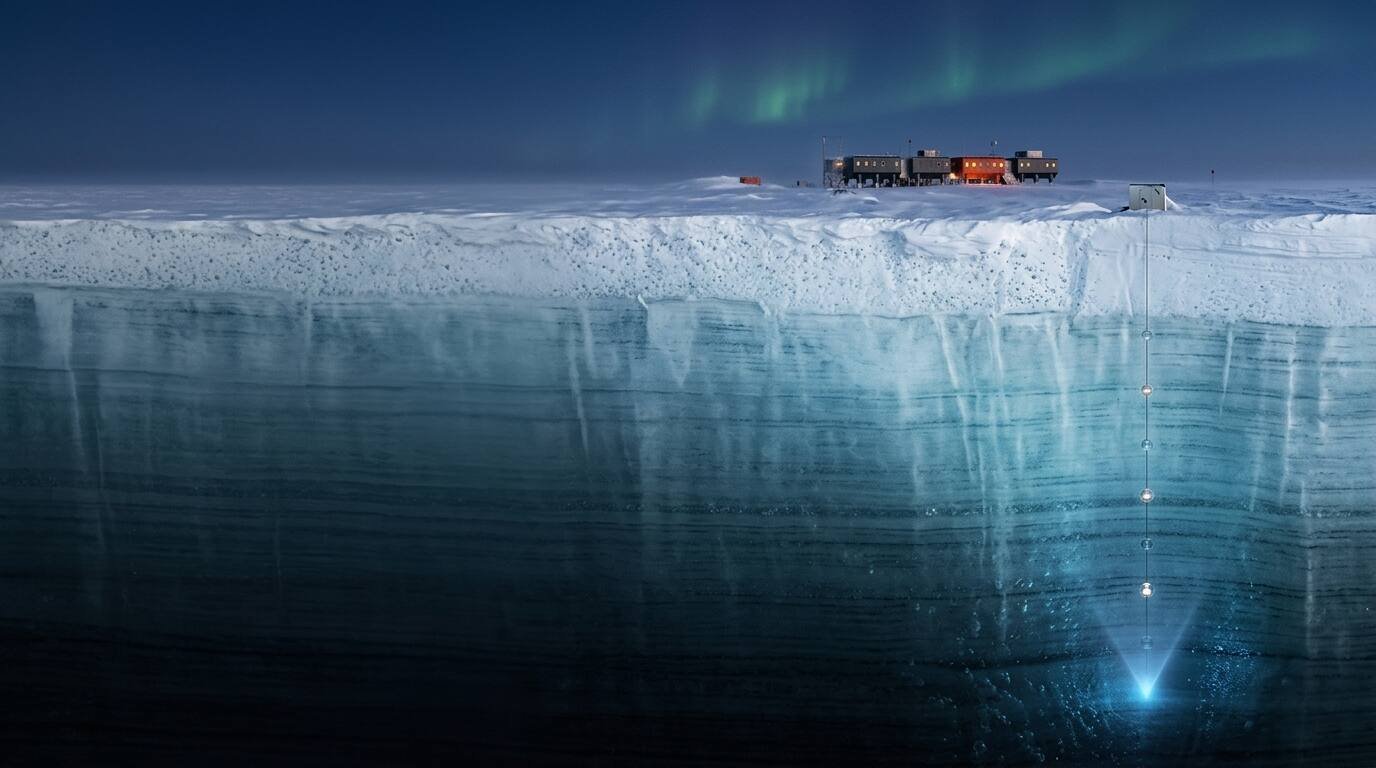 A cutaway view of Antarctic ice with a string of glowing sensors and a blue flash of light from a neutrino collision.